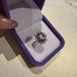 Light amethyst stone on 925 silver setting

Adjustable